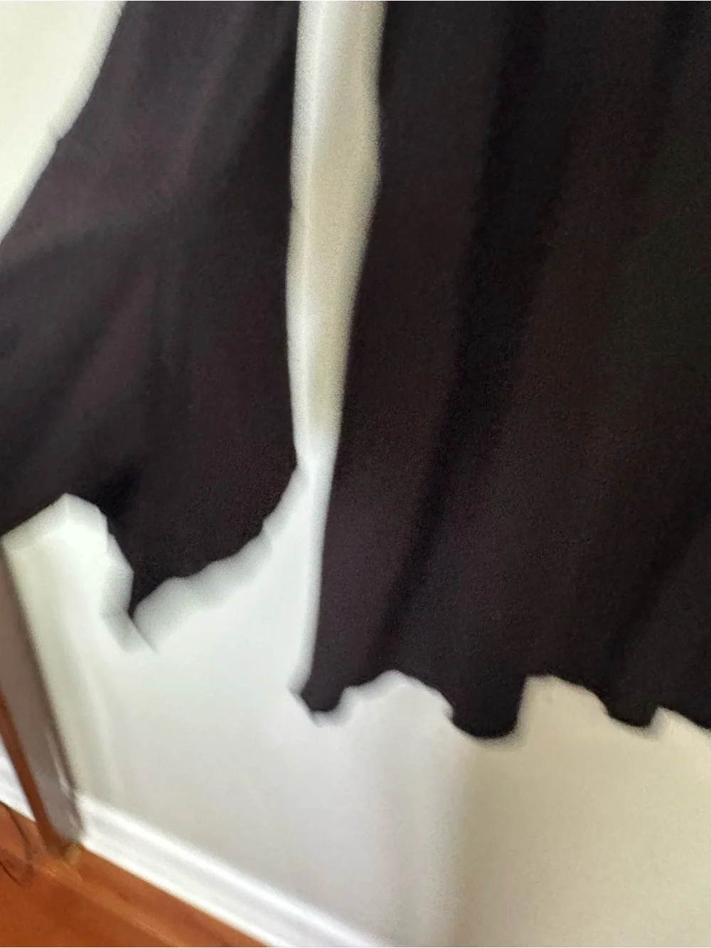Chico's Black Open-Front tunic length Cardigan with tulip sleeves.